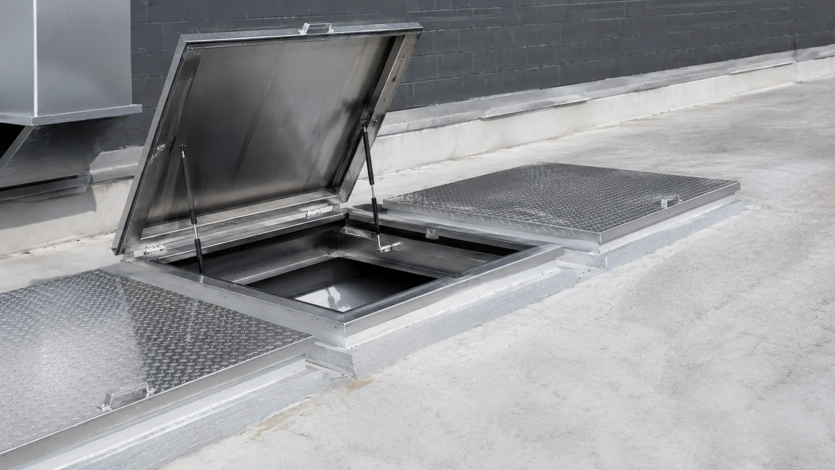 Access Hatch Covers in Maple, Ontario — fabricated and installed by The Grate Guys