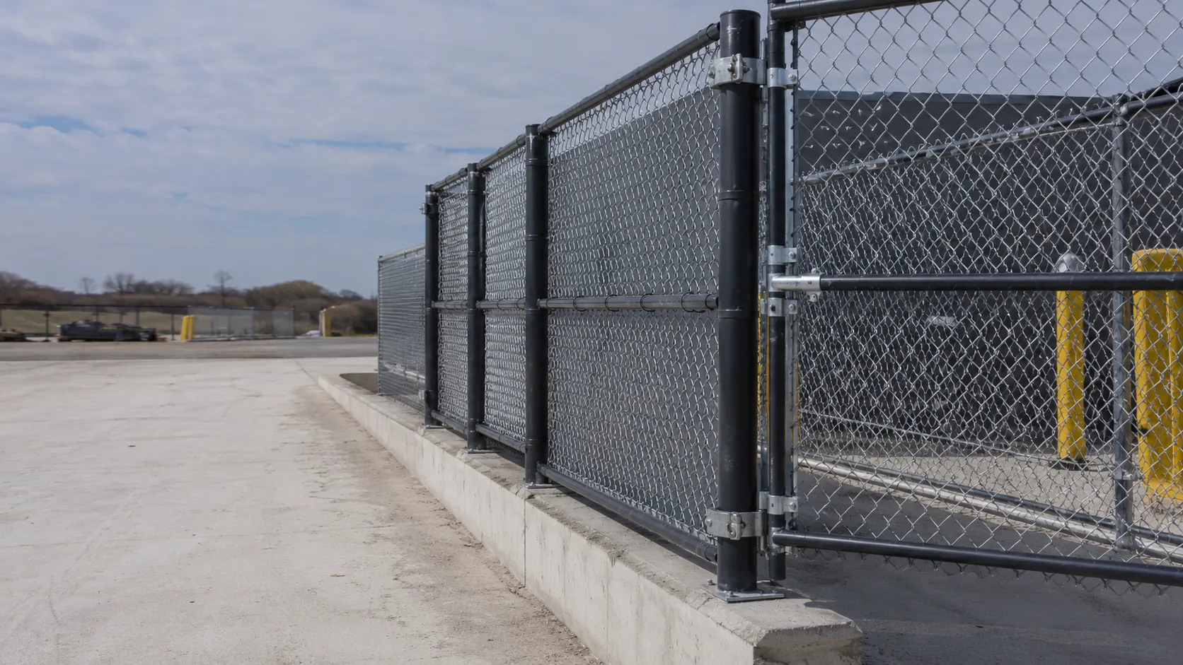 Commercial Chain Link Fencing in Maple, Ontario — fabricated and installed by The Grate Guys