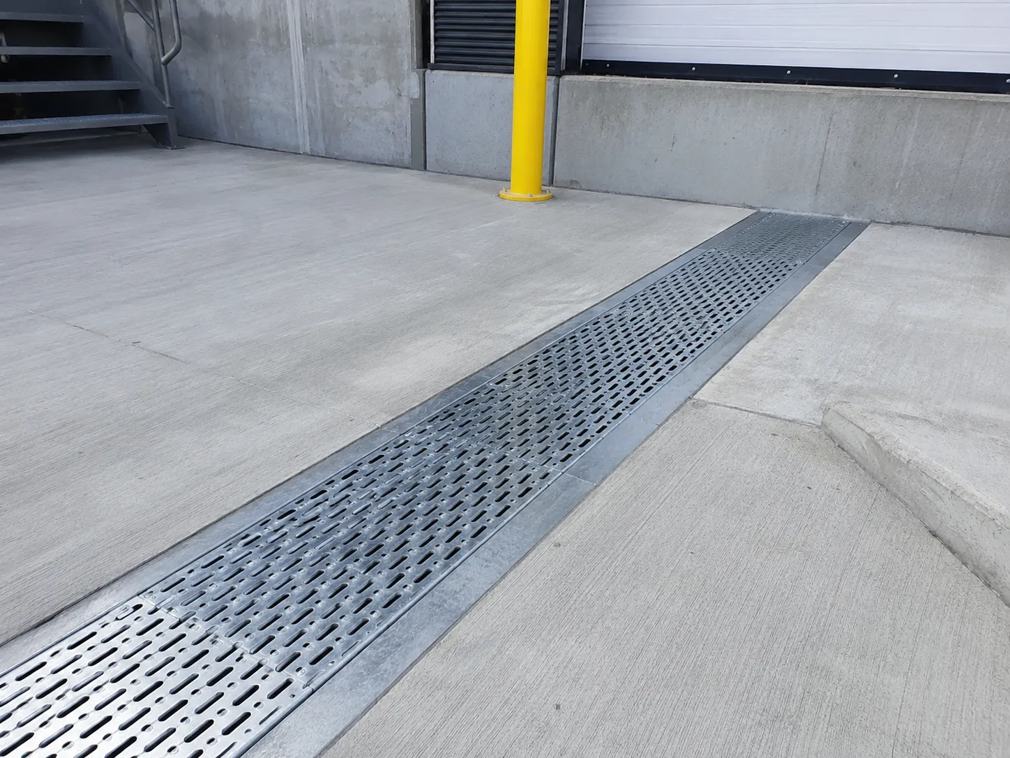 Completed Custom Drain Covers installation in Maple by The Grate Guys