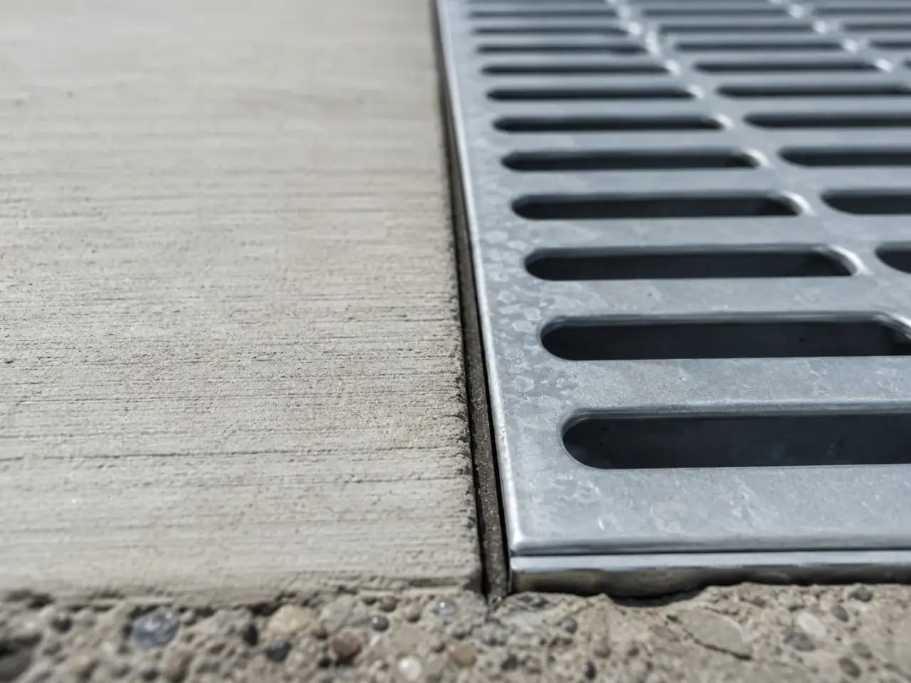 Custom Drainage Solutions being fabricated and installed by The Grate Guys