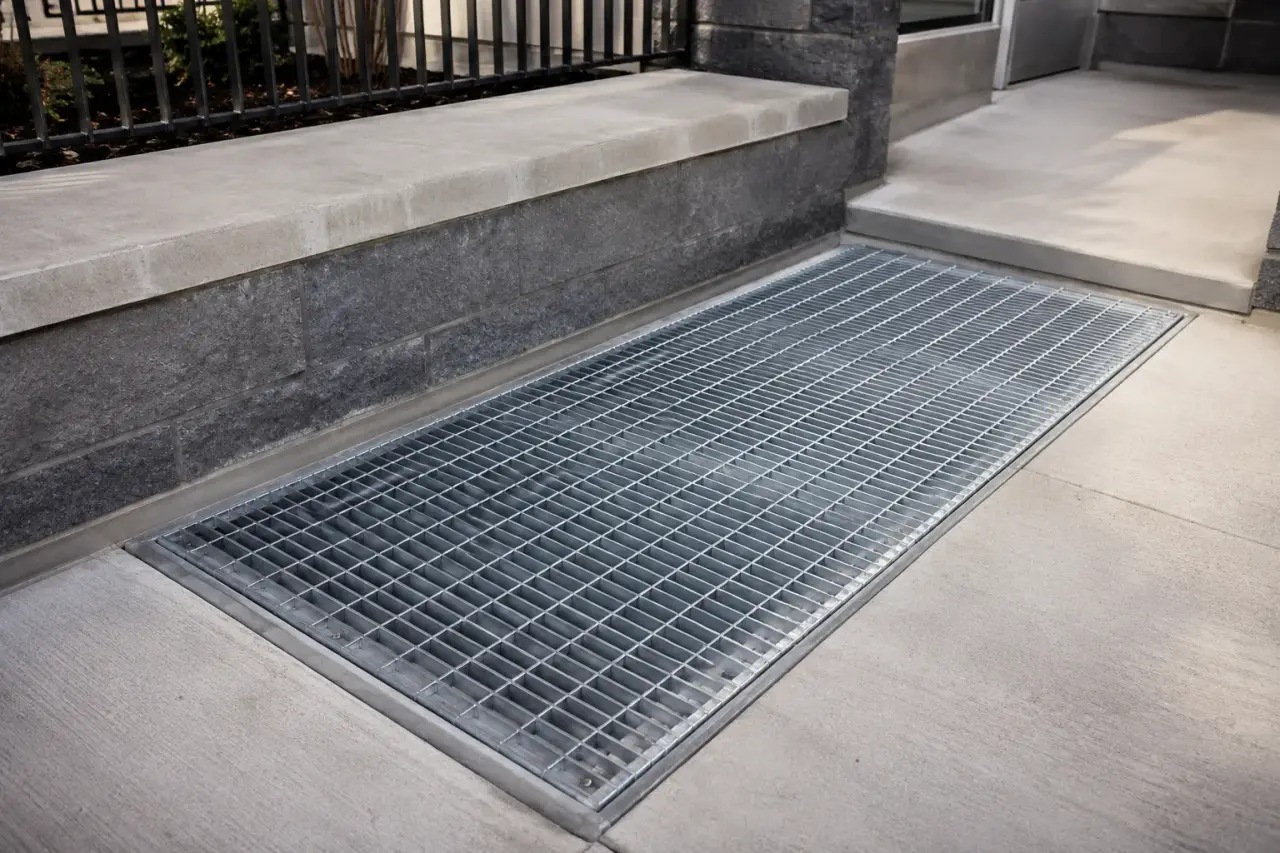 Completed Custom Steel Grates installation by The Grate Guys