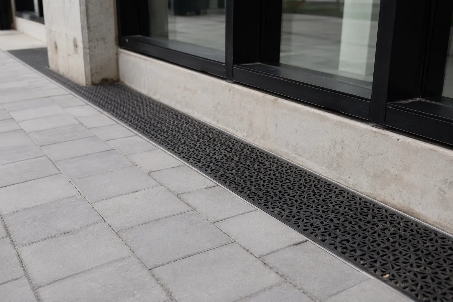 Completed Decorative Metal Grates installation in Maple by The Grate Guys