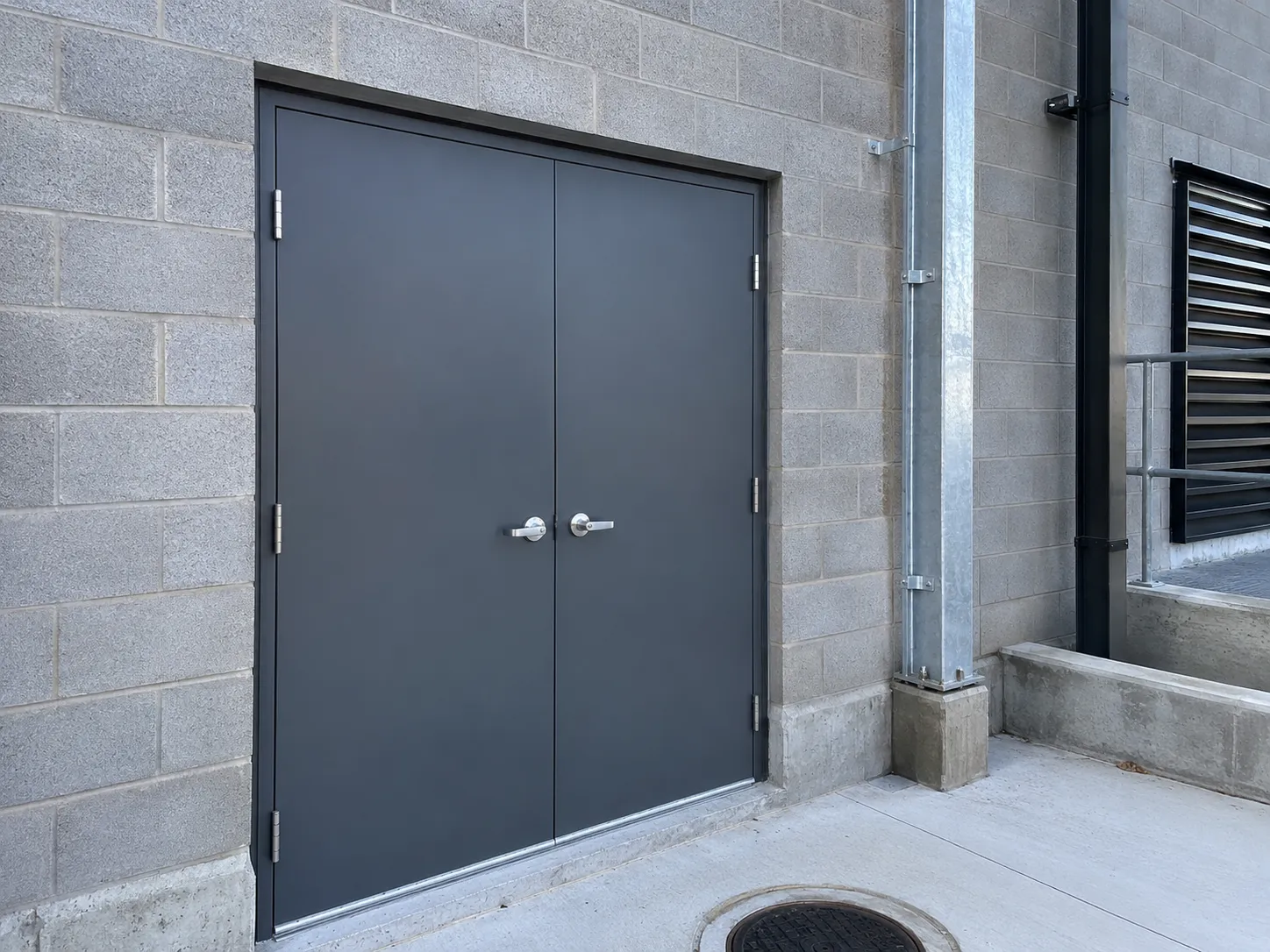 Completed Fire Rated Doors installation in Maple by The Grate Guys