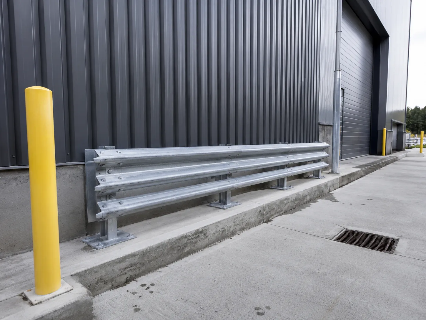 Completed Forklift Protection Barriers installation in Maple by The Grate Guys