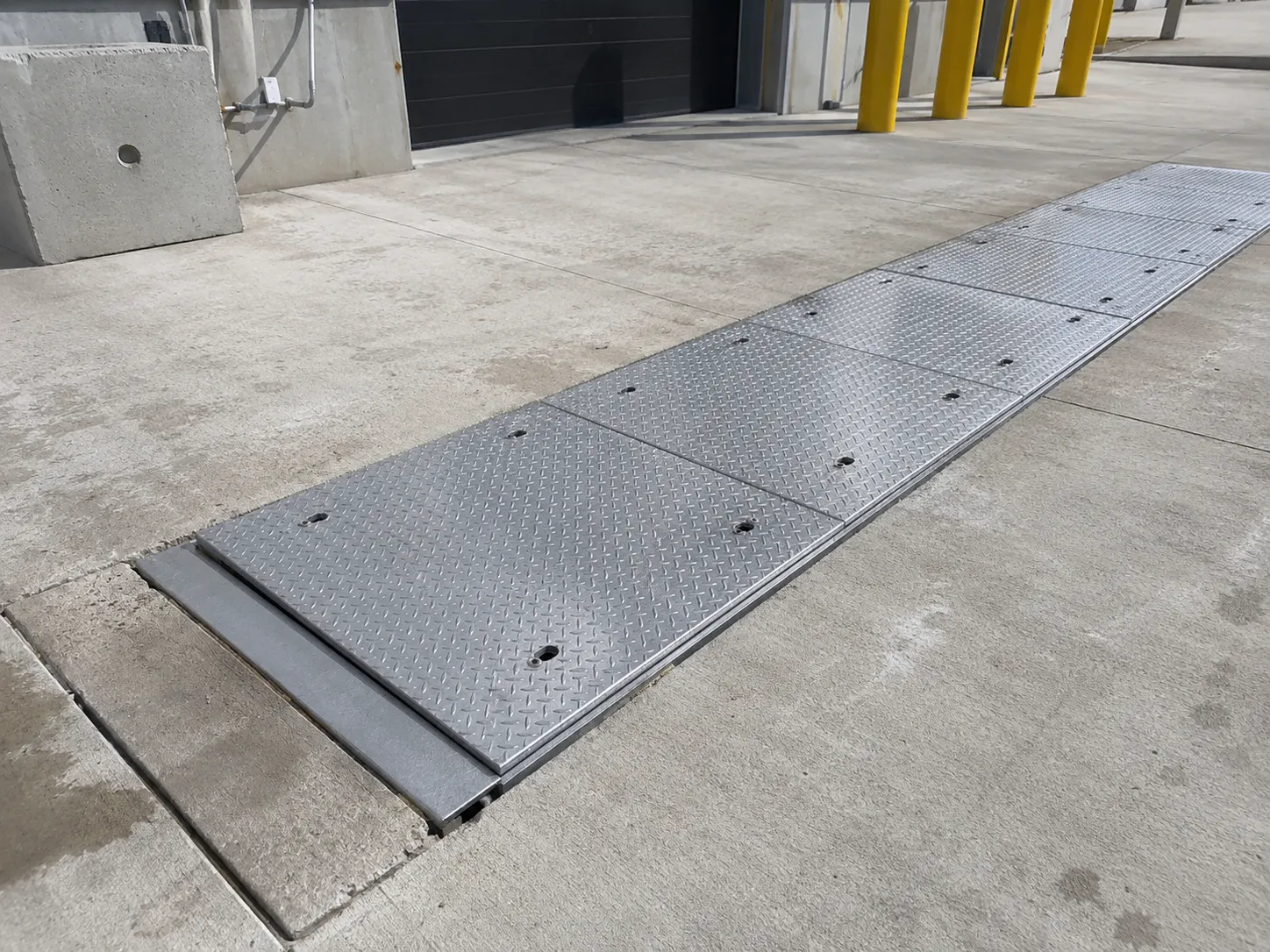 Completed Heavy Duty Trench Covers installation in Maple by The Grate Guys