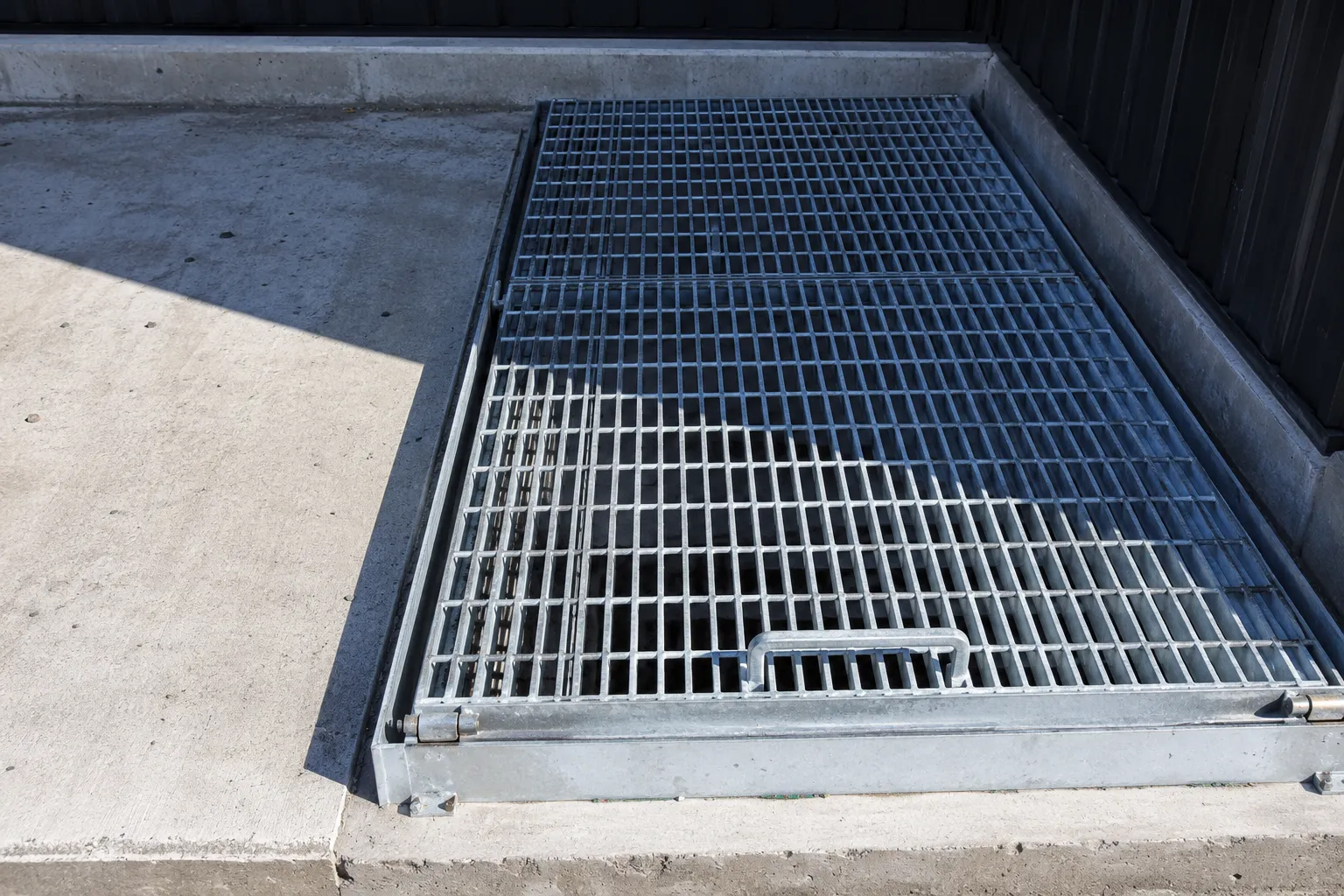 Latched and Hinged Grates in Markham, Ontario — fabricated and installed by The Grate Guys