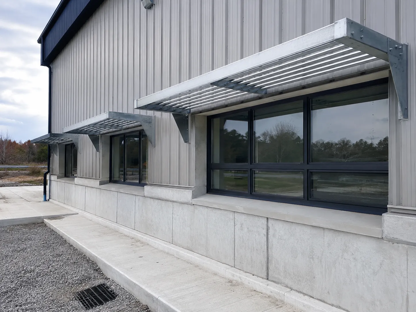 Completed Metal Sunshades installation in Maple by The Grate Guys