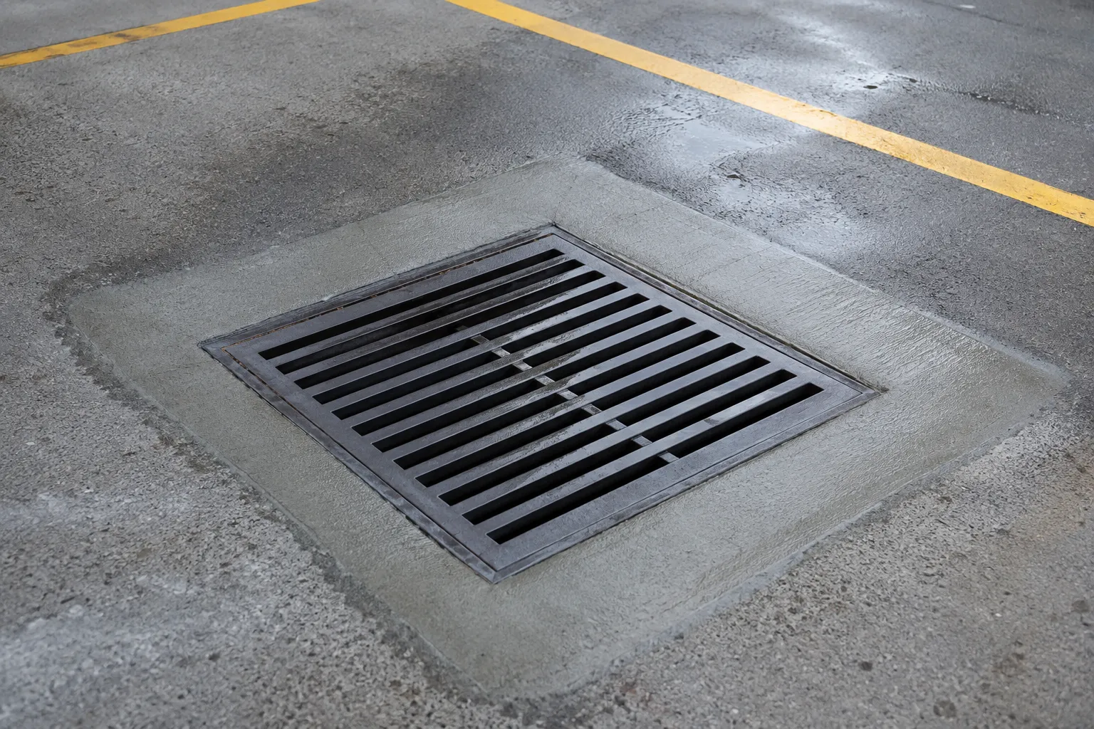 Completed Parking Lot Drainage and Grate Repair installation in Maple by The Grate Guys