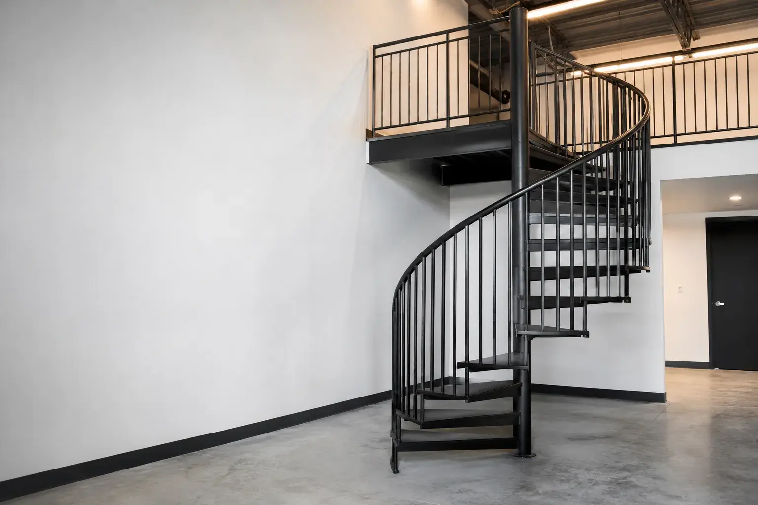 Spiral Staircases in Markham, Ontario, fabricated and installed by The Grate Guys