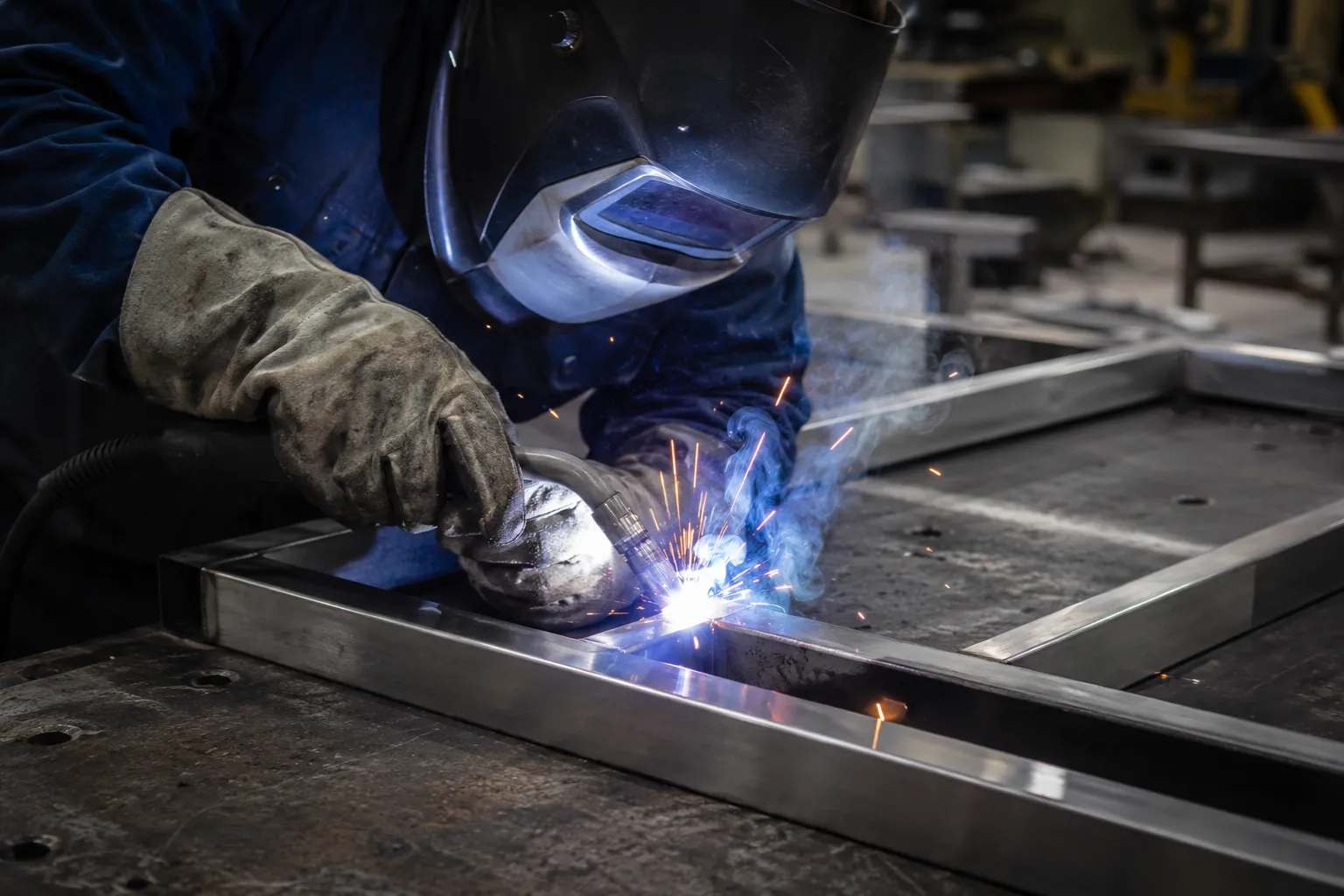 Stainless Steel Tables in Maple being fabricated and installed by The Grate Guys