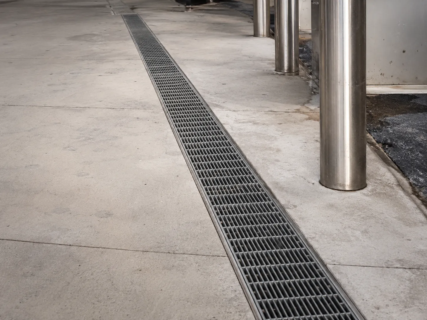 Completed Trench Drain Grates installation in Maple by The Grate Guys
