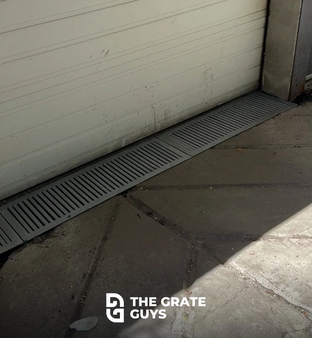 After — new driveway & surface drainage grates fabricated and installed at a property in The Beaches, Toronto by The Grate Guys